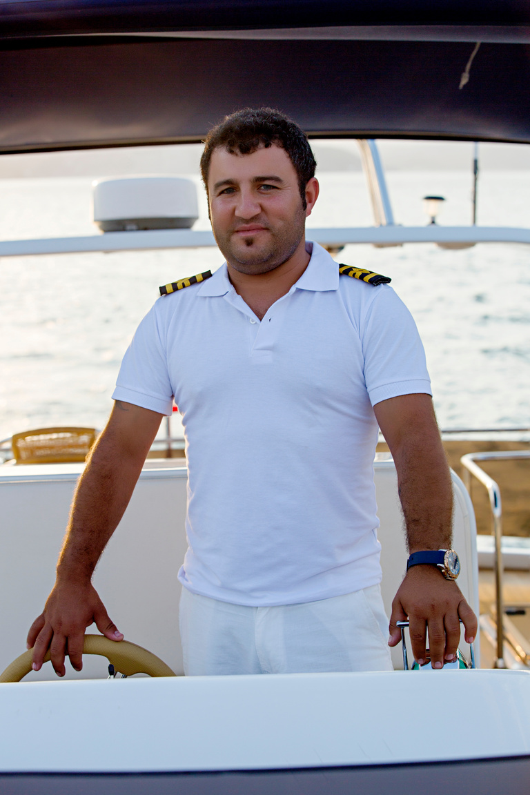 Captain boarding a sail boat